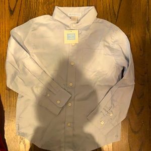 Light blue with white diamond stitching, very subtle. Perfect condition.